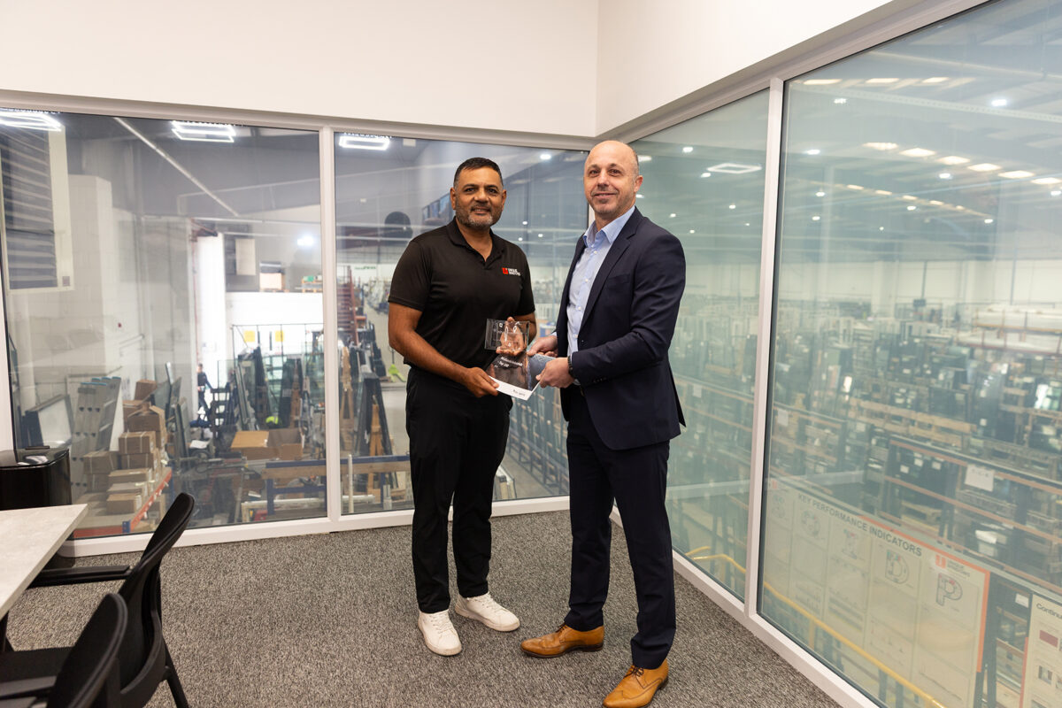 Pictured: Atul Patel, joint managing director, Unique Window Systems (left) is presented with an award recognising the company’s inclusion in the Midlands Industrial Top 100 2026 by John Bryant, corporate finance partner, at MHA.